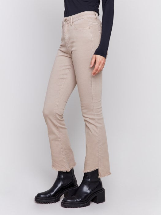 Asymmetrical hem shops jeans